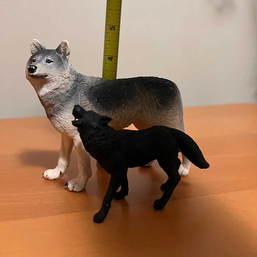2 plastic wolf lot